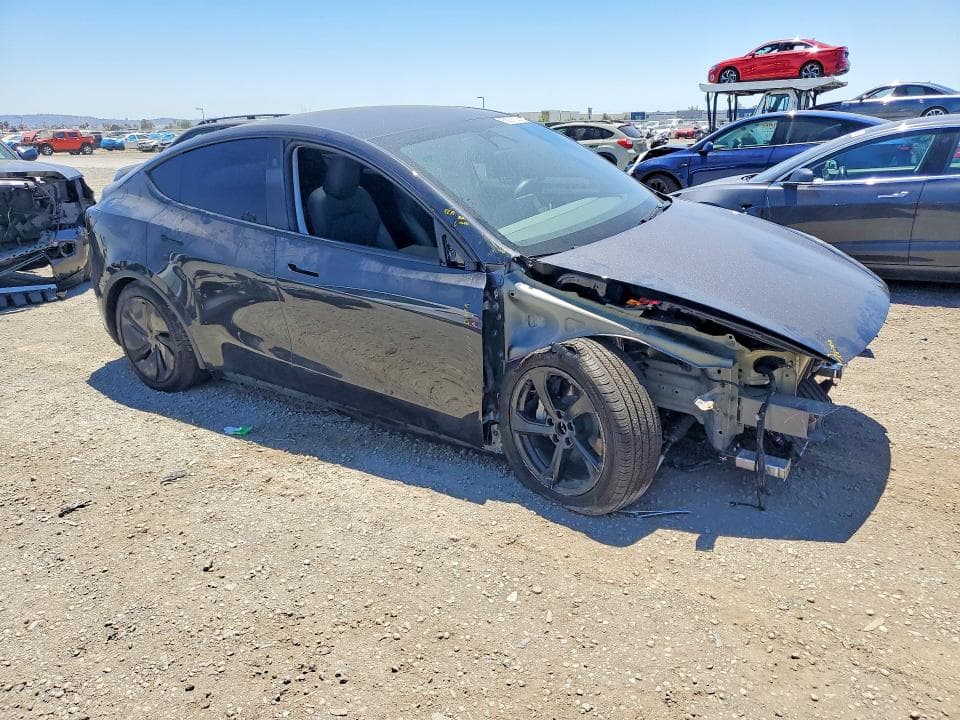 2026 TESLA MODEL Y 4