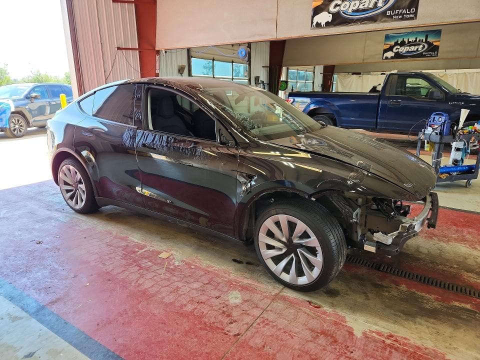 2026 TESLA MODEL Y 4