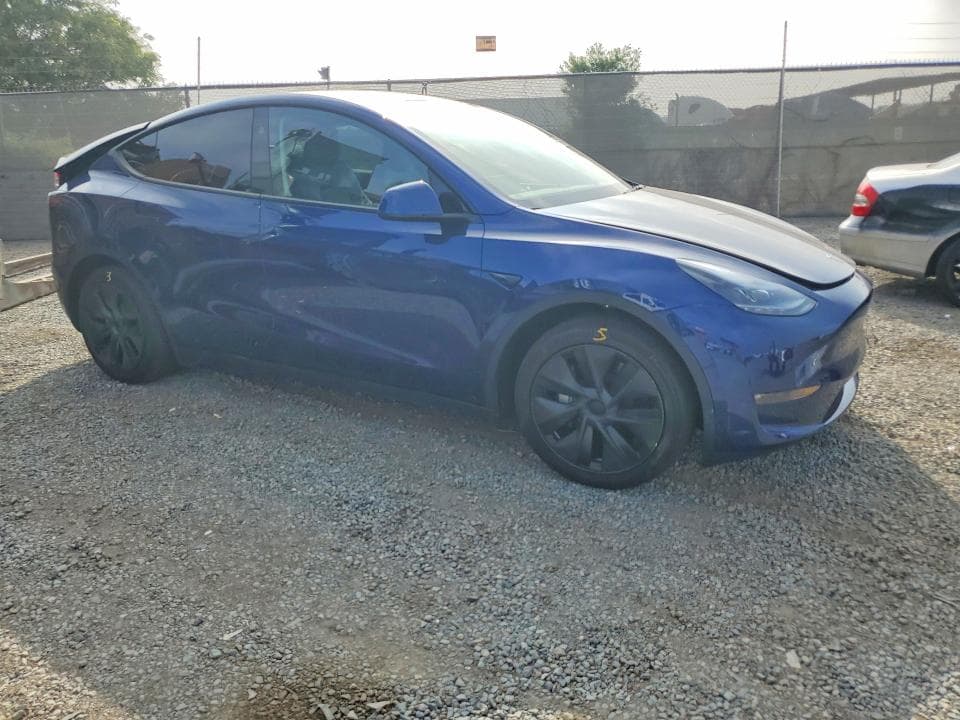 2025 TESLA MODEL Y 4